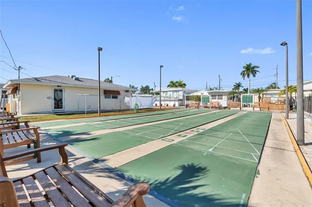 a view of a swimming pool with a lounge chairs