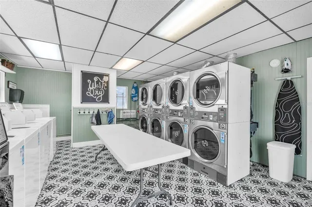 a living room with a couch and a stove top oven