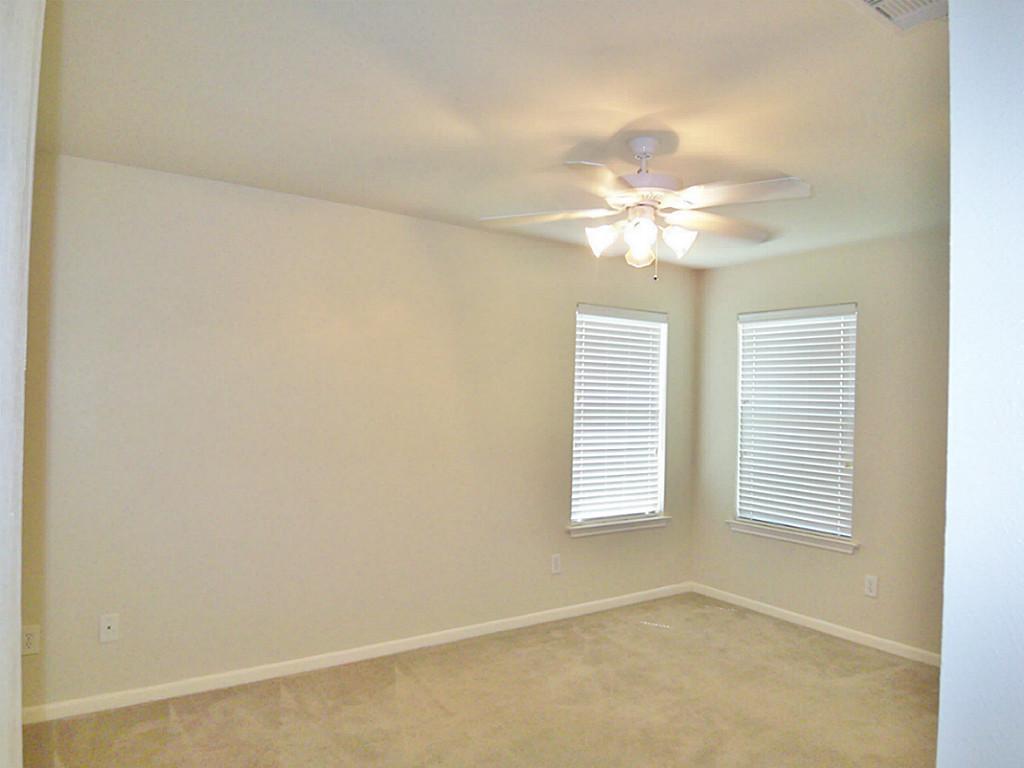 7335 Kransburg Ranch Drive Cypress, TX 77433 - Photo 9 of 21 Master Bedroom. Ceiling fan in all bedrooms.