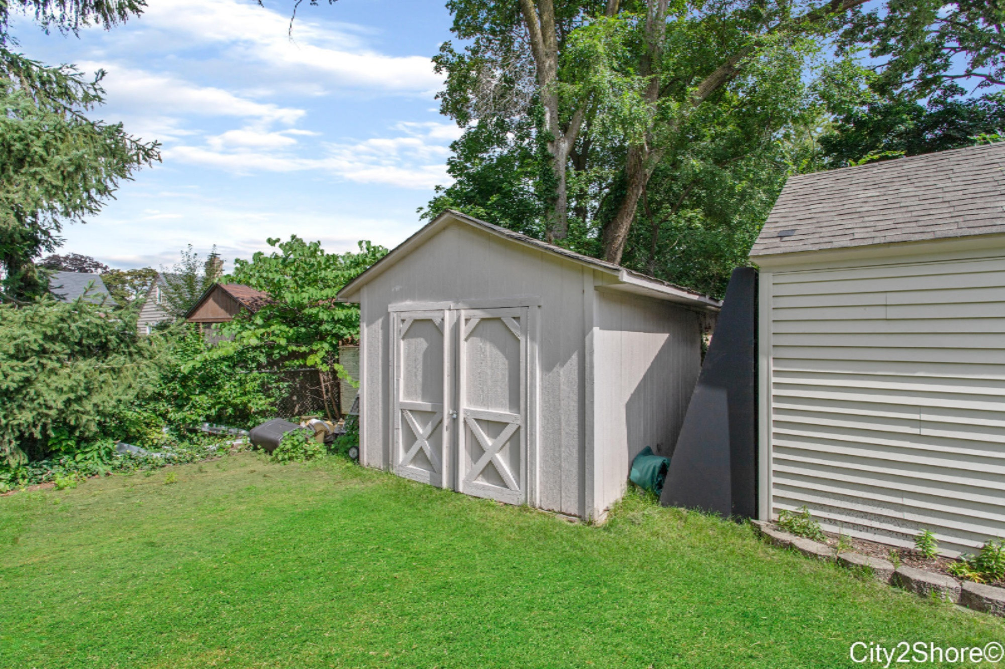 129 Manchester Road Southwest Wyoming, MI 49548 - Photo 31 of 32 Storage Shed in Backyard