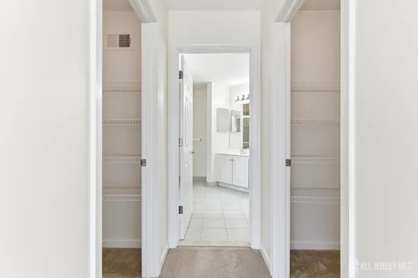 a view of a bathroom from a hallway