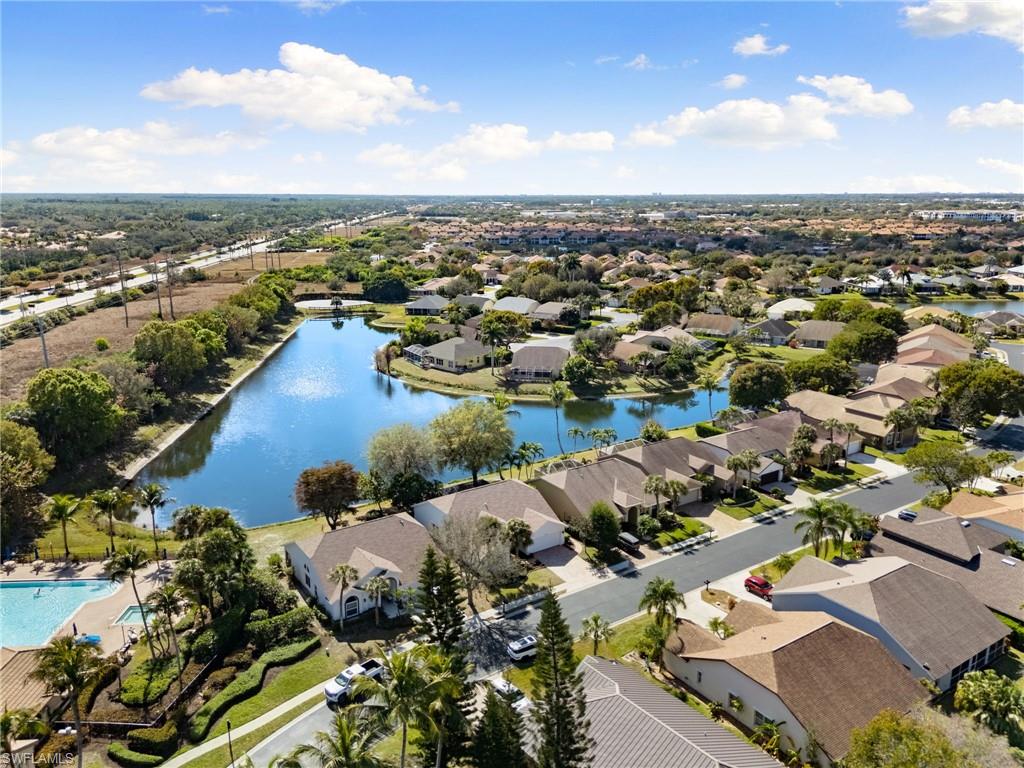 7867 Gardner Drive Naples, FL 34109 - Photo 29 of 36 Aerial view of residential area featuring a large body of water