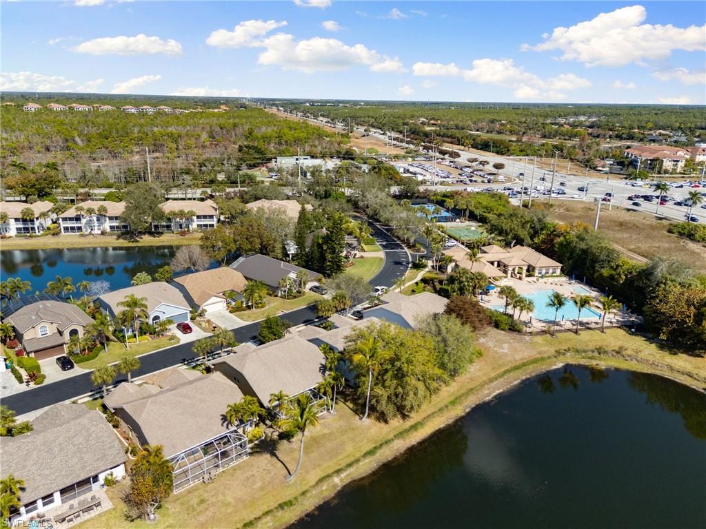 7867 Gardner Drive Naples, FL 34109 - Photo 31 of 36 Aerial perspective of suburban area with a large body of water