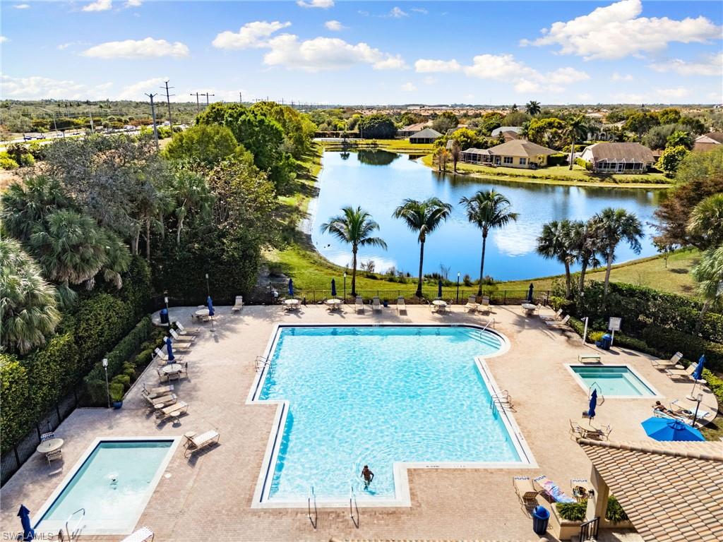 7867 Gardner Drive Naples, FL 34109 - Photo 34 of 36 Community pool featuring a patio area