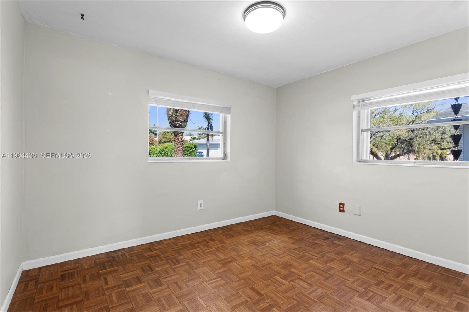 11807 Southwest 112th Avenue Miami, FL 33176 - Photo 12 of 48 an empty room with a window