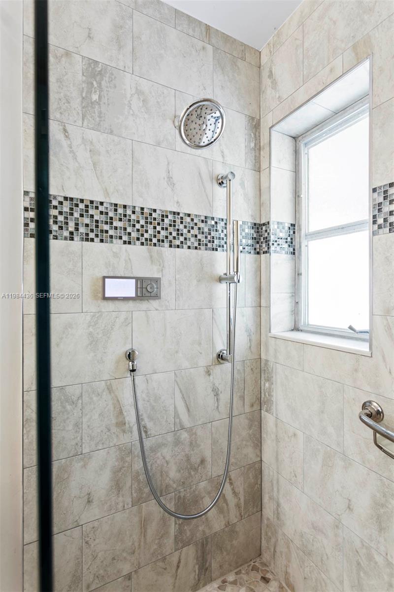 11807 Southwest 112th Avenue Miami, FL 33176 - Photo 14 of 48 a bathroom with a shower