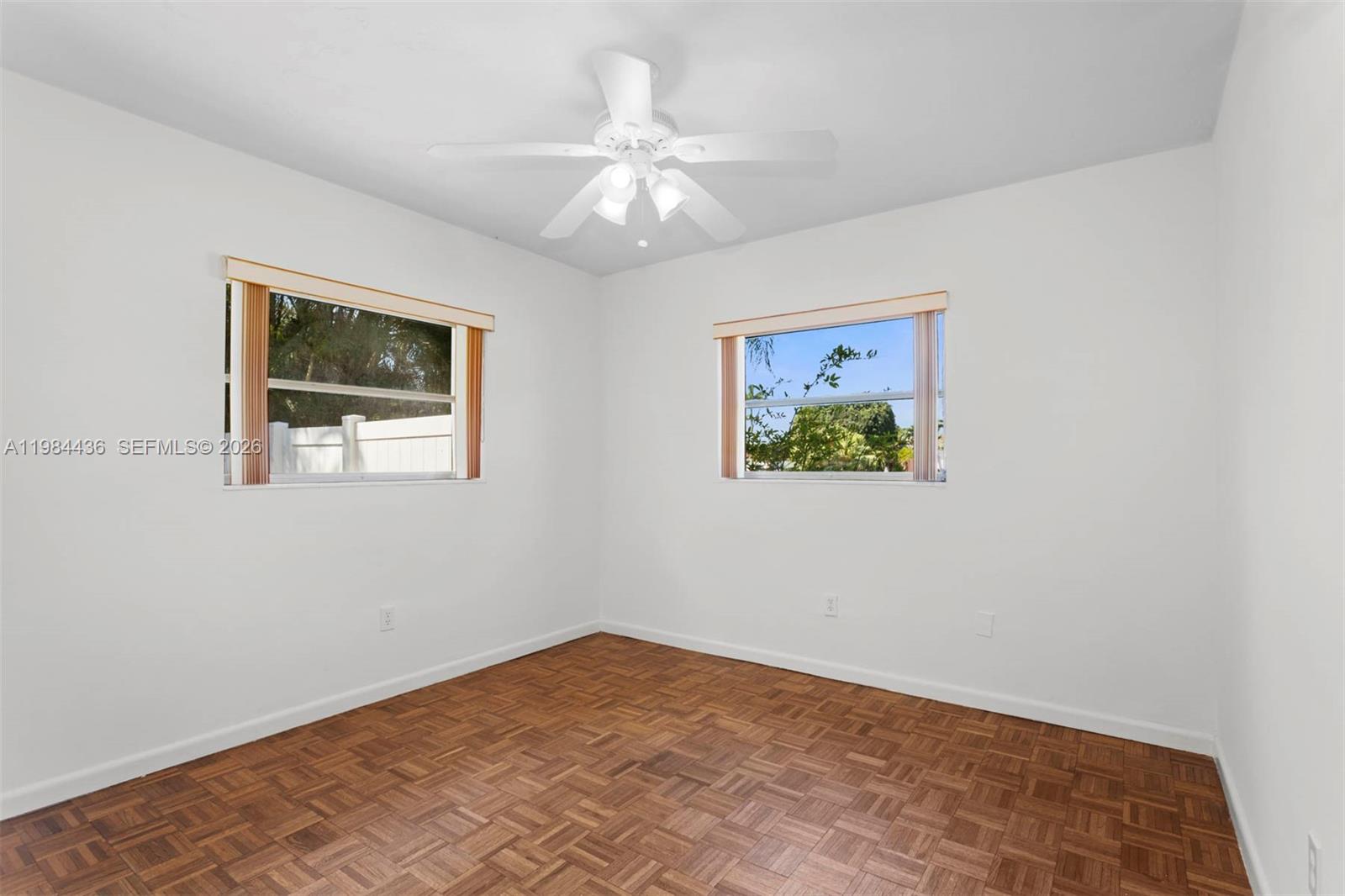 11807 Southwest 112th Avenue Miami, FL 33176 - Photo 15 of 48 a view of an empty room with a window
