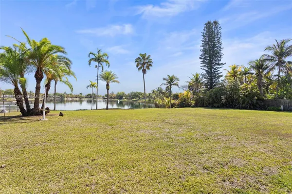 a view of a swimming pool and an outdoor space