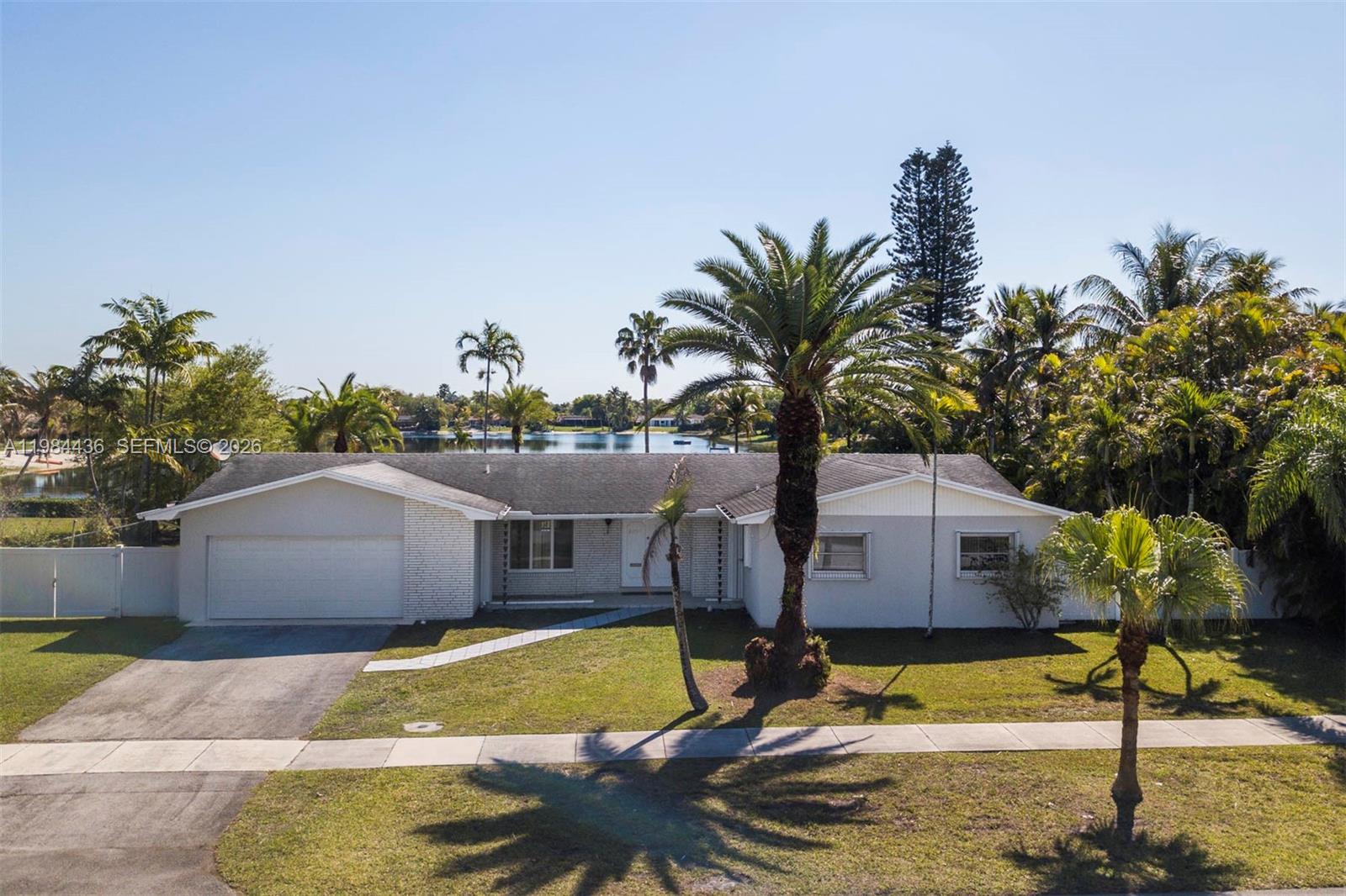11807 Southwest 112th Avenue Miami, FL 33176 - Photo 36 of 48 a view of a swimming pool with a patio