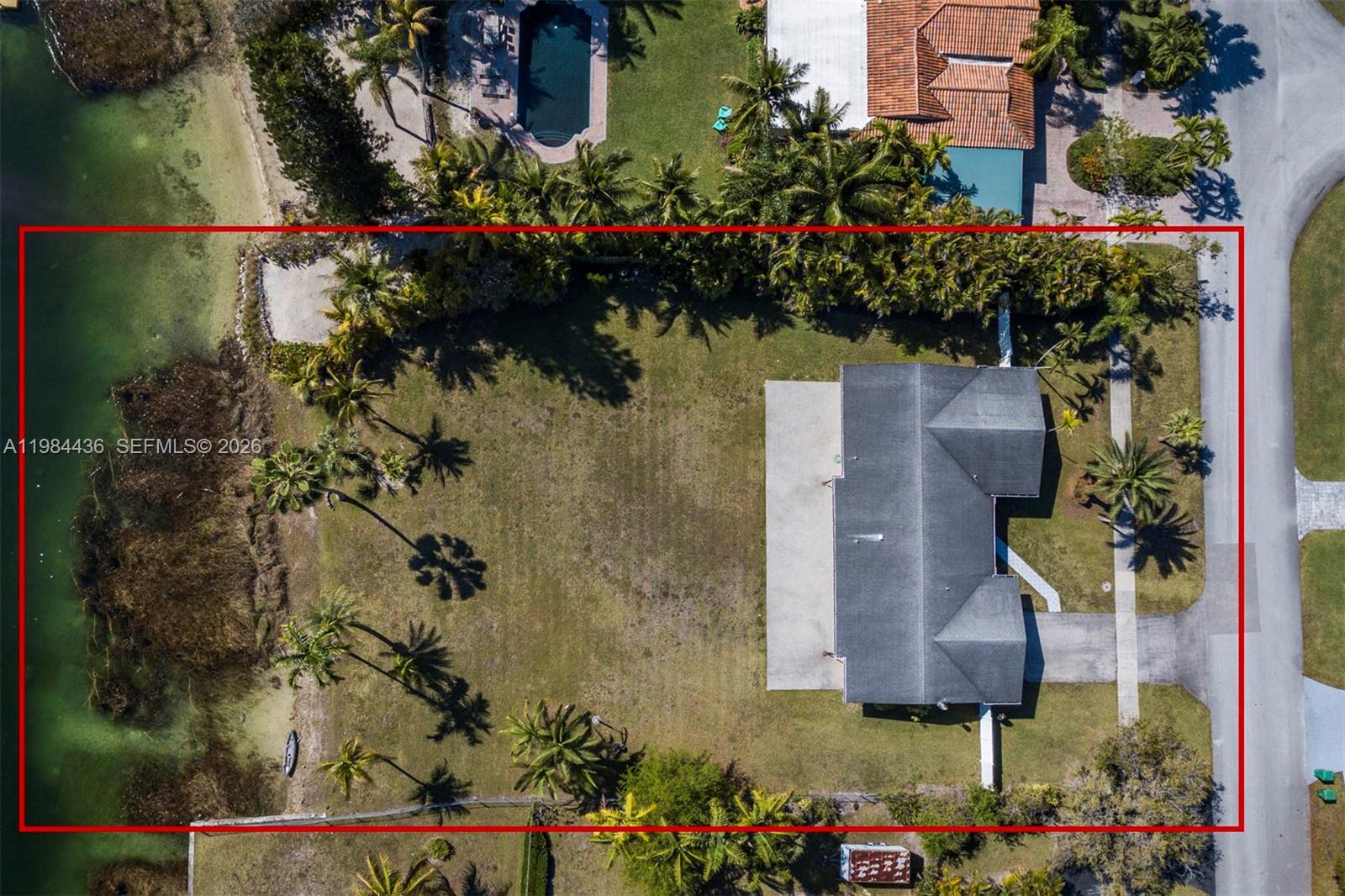 11807 Southwest 112th Avenue Miami, FL 33176 - Photo 40 of 48 an aerial view of a house with a yard and garden