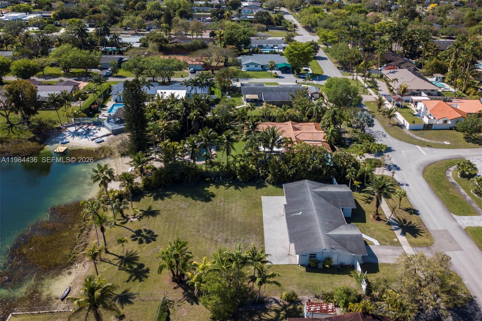 11807 Southwest 112th Avenue Miami, FL 33176 - Photo 48 of 48 an aerial view of residential house with outdoor space and lake view