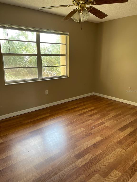 4800 Rilma Avenue, Unit 146 Sarasota, FL 34234 - Photo 9 of 15 an empty room with a window