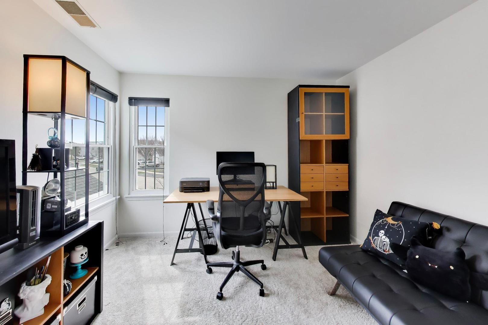 17804 Braewick Road Gurnee, IL 60031 - Photo 19 of 27 a view of a workspace with furniture and a window