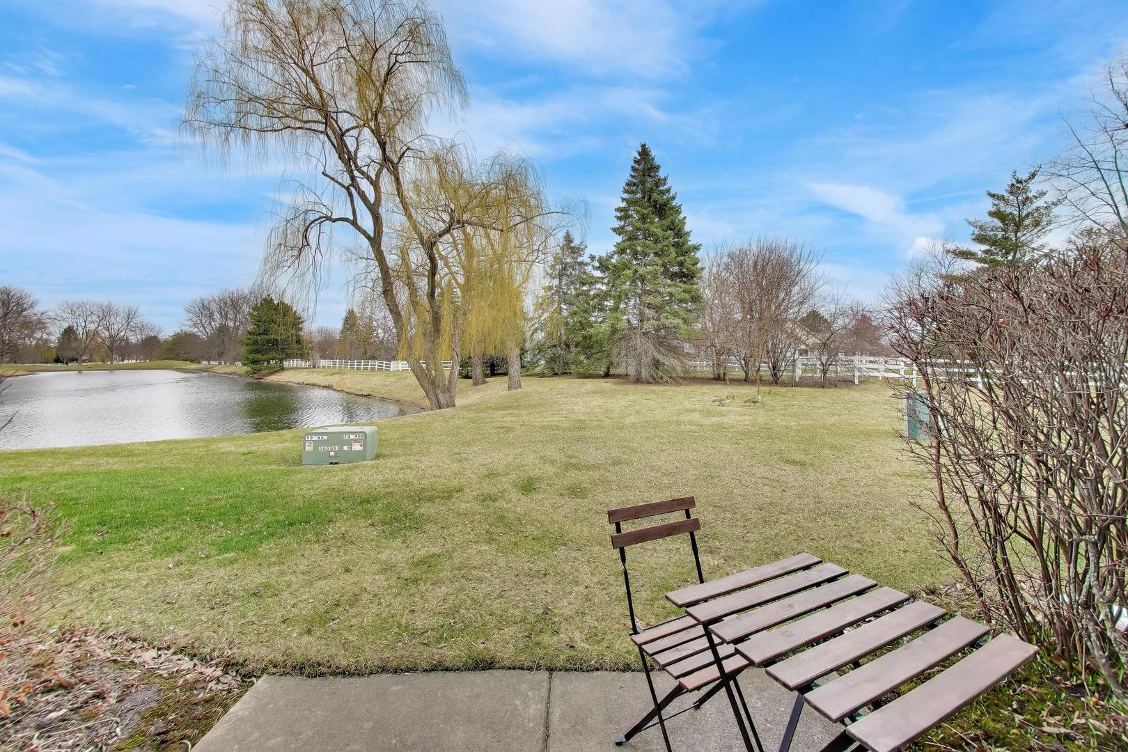 17804 Braewick Road Gurnee, IL 60031 - Photo 24 of 27 a view of a lake with a outdoor space
