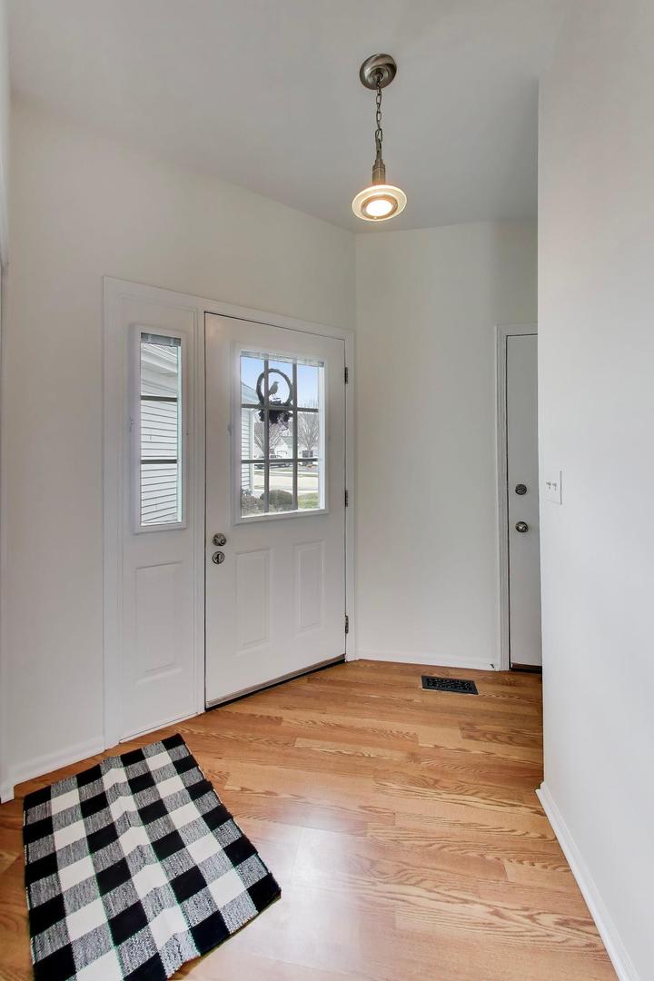17804 Braewick Road Gurnee, IL 60031 - Photo 3 of 27 a view of a room with window and hardwood floor