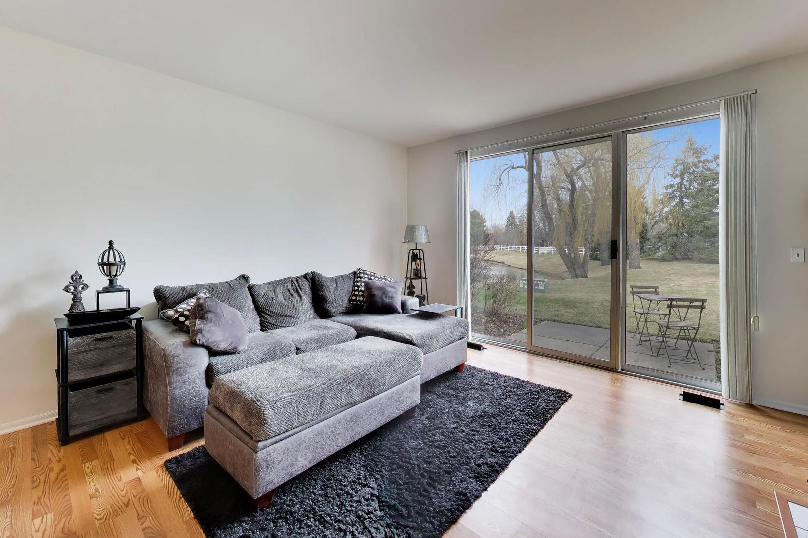 17804 Braewick Road Gurnee, IL 60031 - Photo 4 of 27 a living room with furniture and a window