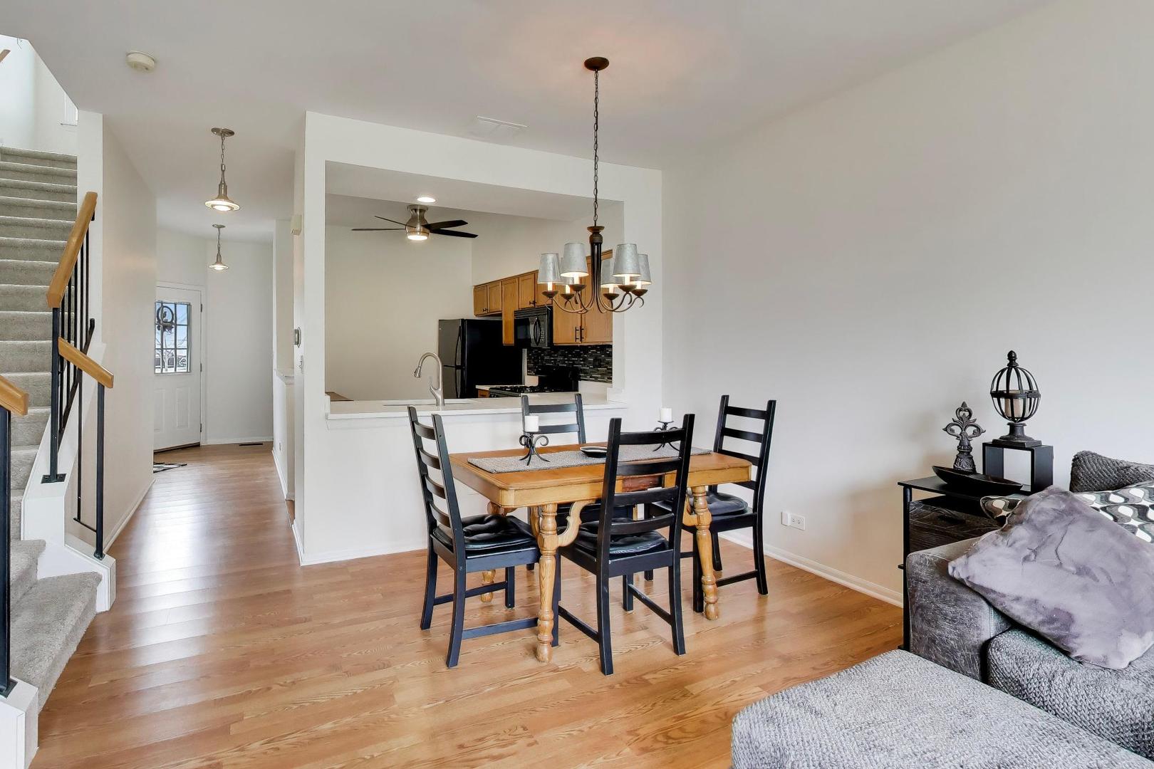 17804 Braewick Road Gurnee, IL 60031 - Photo 7 of 27 a view of a dining room with furniture