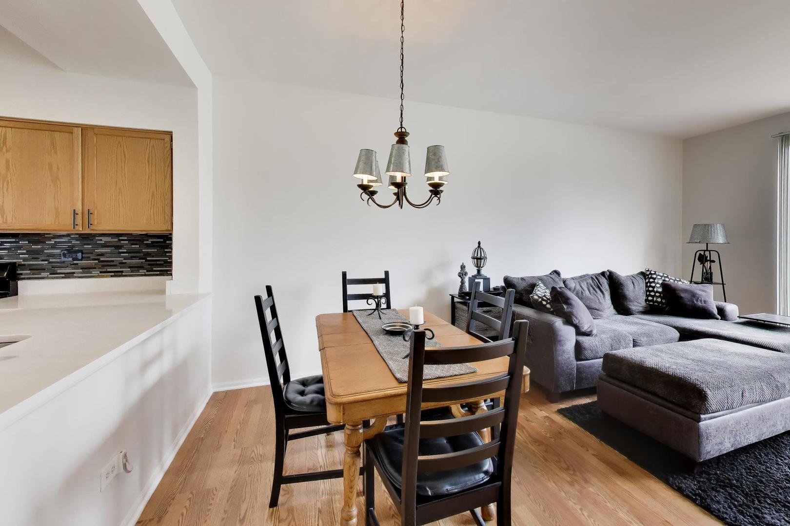 17804 Braewick Road Gurnee, IL 60031 - Photo 8 of 27 a view of a dining room with furniture window and outside view
