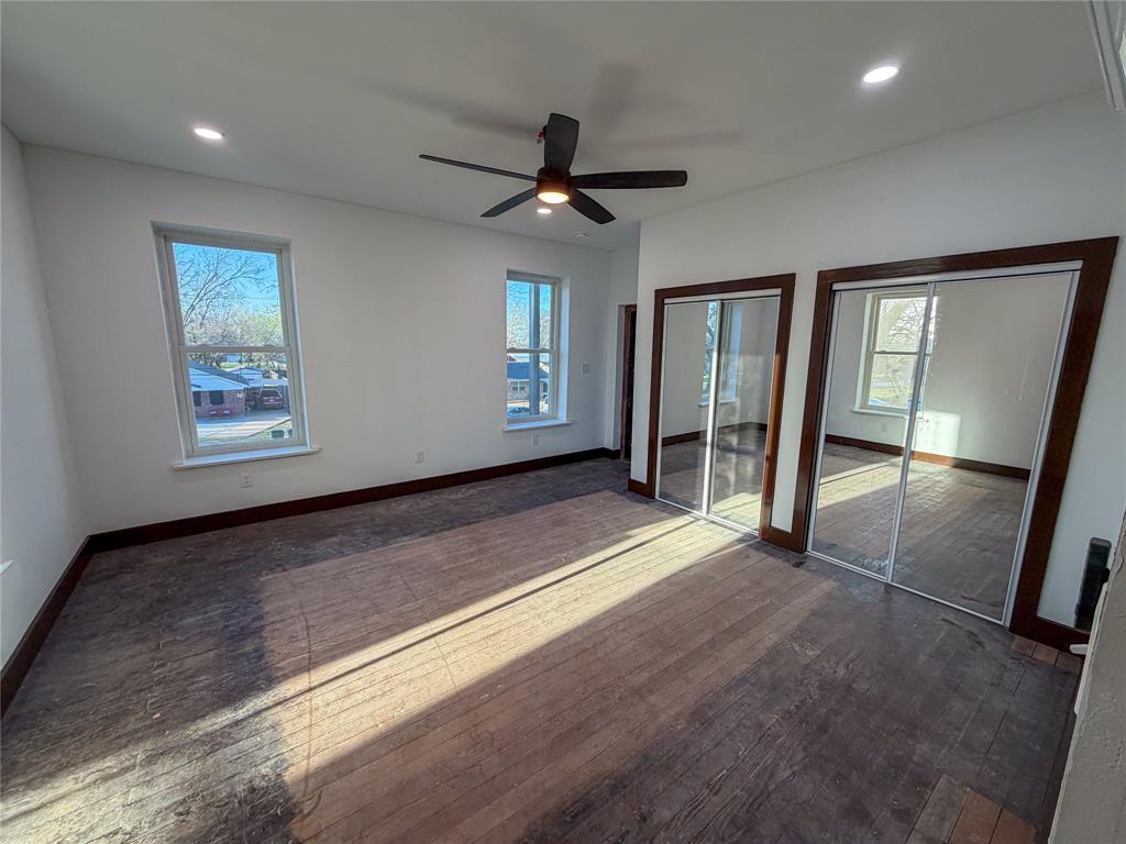 107 East Stone Street, Unit B Collinsville, TX 76233 - Photo 5 of 16 a view of an empty room with a window