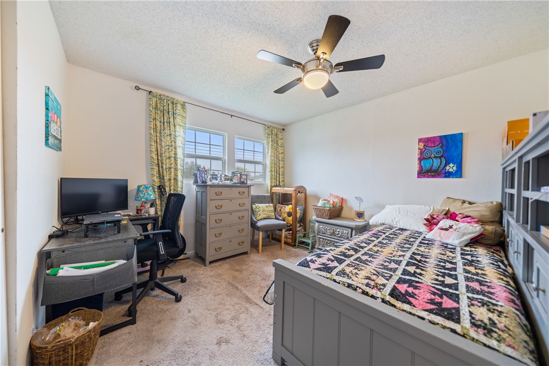 4338 Yucca Street Corpus Christi, TX 78411 - Photo 18 of 31 a bedroom with a workspace