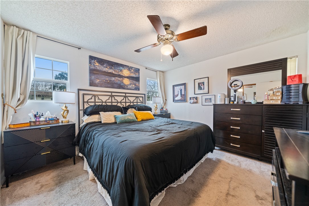 4338 Yucca Street Corpus Christi, TX 78411 - Photo 19 of 31 a bed room with a bed and a tv