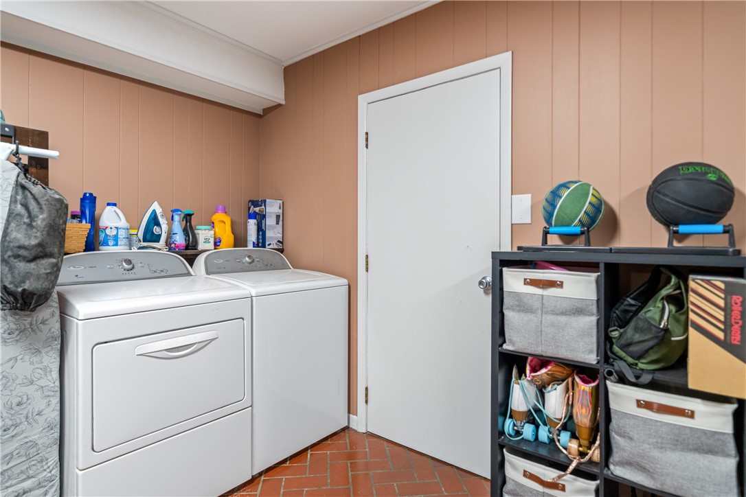 4338 Yucca Street Corpus Christi, TX 78411 - Photo 24 of 31 a utility room with dryer and washer