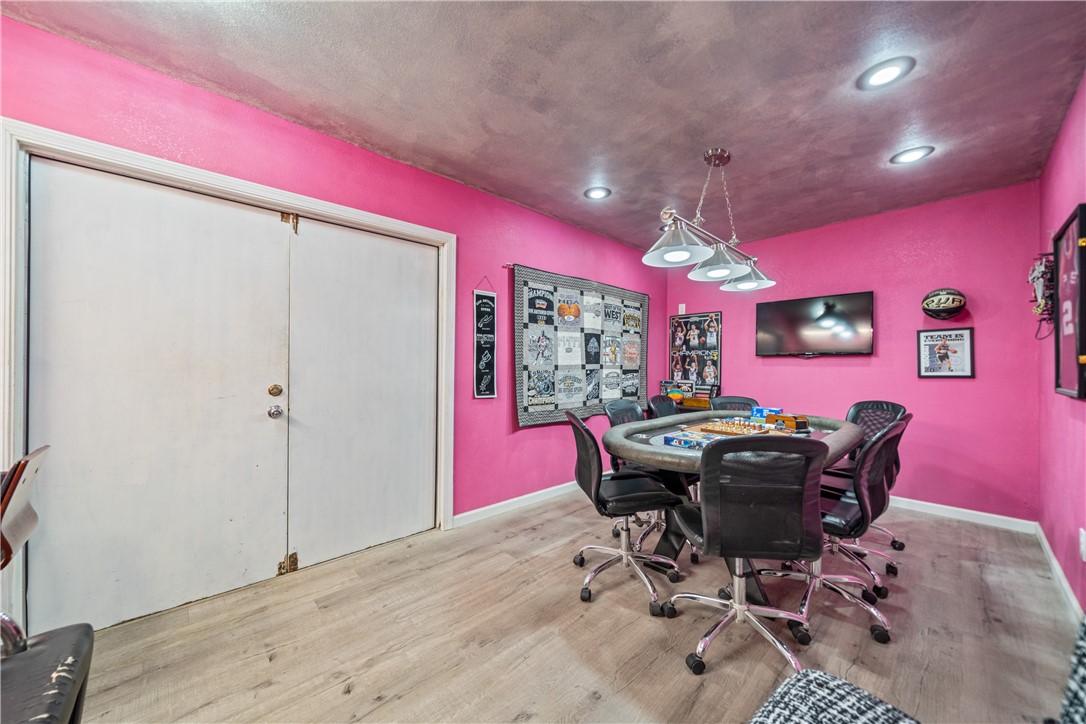 4338 Yucca Street Corpus Christi, TX 78411 - Photo 26 of 31 a view of a dining room with furniture and chandelier