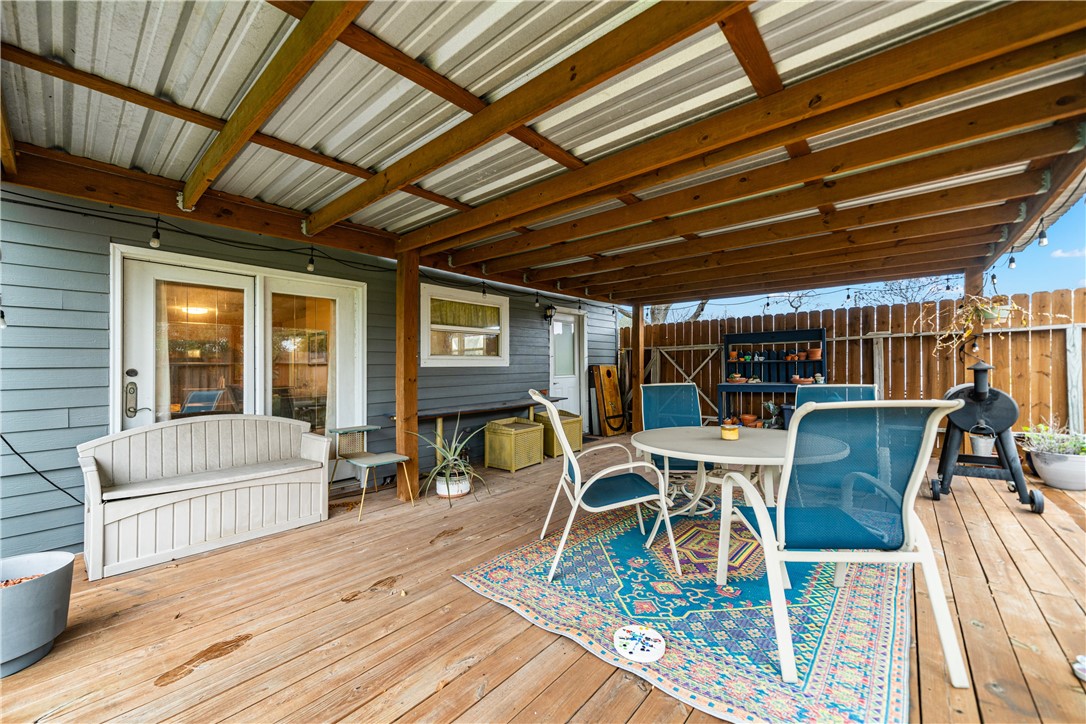 4338 Yucca Street Corpus Christi, TX 78411 - Photo 29 of 31 a outdoor space with lots of tables and chairs