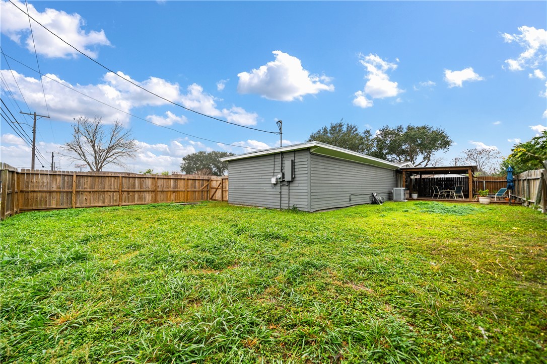 4338 Yucca Street Corpus Christi, TX 78411 - Photo 31 of 31 a view of a backyard with a garden