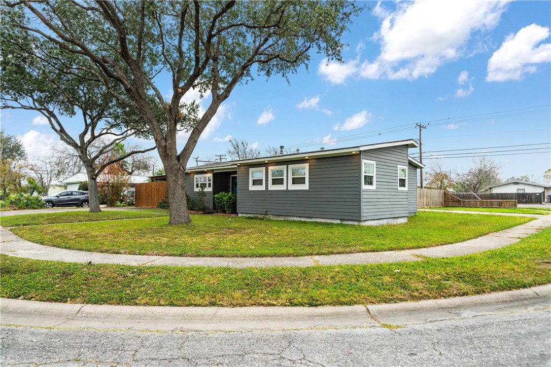 4338 Yucca Street Corpus Christi, TX 78411 - Photo 4 of 31 a view of a house with a big yard