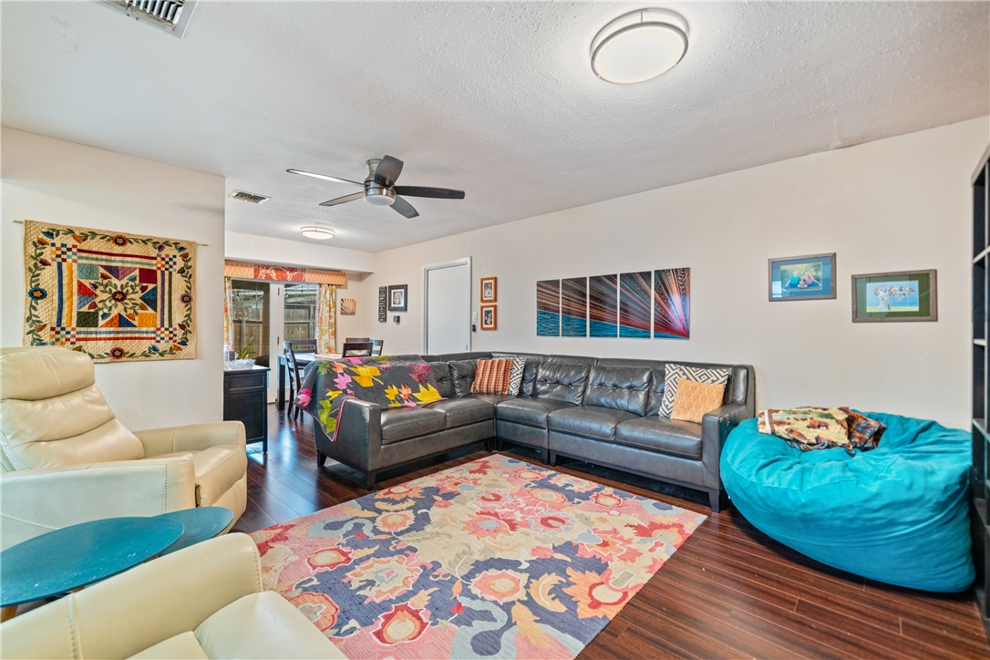 4338 Yucca Street Corpus Christi, TX 78411 - Photo 8 of 31 a living room with furniture and wooden floor