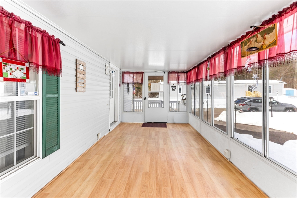 51 Tucker Terrace Raynham, MA 02767 - Photo 12 of 35 a view of entryway with wooden floor
