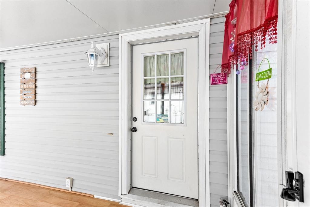 51 Tucker Terrace Raynham, MA 02767 - Photo 13 of 35 a view of a entryway door of the house