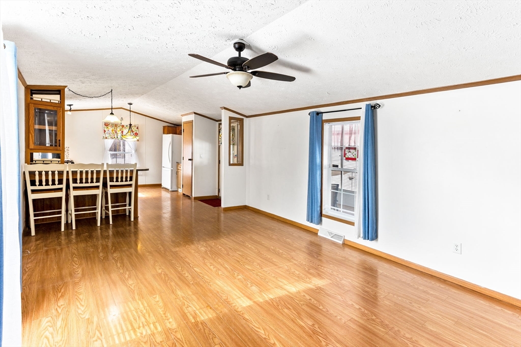 51 Tucker Terrace Raynham, MA 02767 - Photo 15 of 35 a view of livingroom with furniture and wooden floor