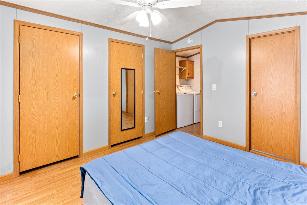 51 Tucker Terrace Raynham, MA 02767 - Photo 24 of 35 wooden floor in an empty room with a window