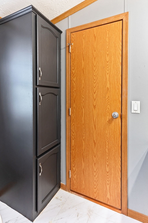 51 Tucker Terrace Raynham, MA 02767 - Photo 28 of 35 a view of walk in closet with empty space