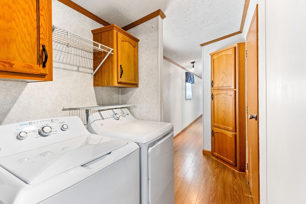 51 Tucker Terrace Raynham, MA 02767 - Photo 30 of 35 a utility room with dryer and washer