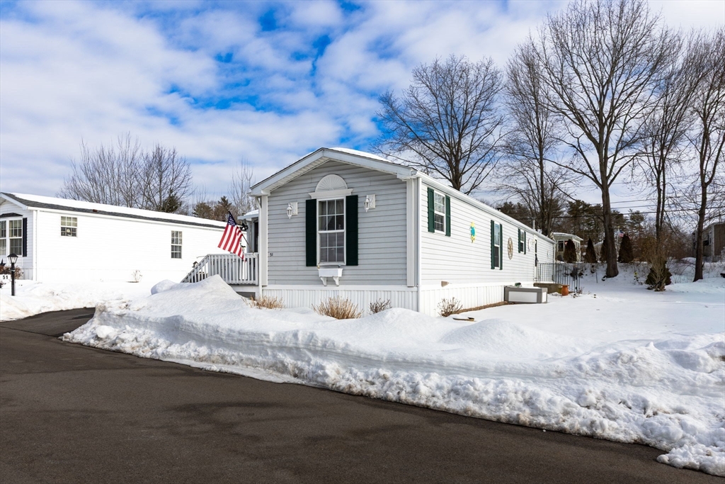 51 Tucker Terrace Raynham, MA 02767 - Photo 4 of 35 a view of a house with snow on the road