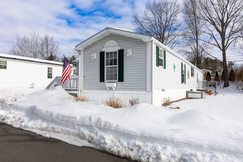51 Tucker Terrace Raynham, MA 02767 - Photo 5 of 35 a view of a house with snow on the road