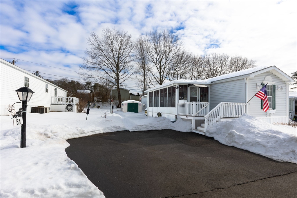 51 Tucker Terrace Raynham, MA 02767 - Photo 6 of 35 a view of a back yard of the house