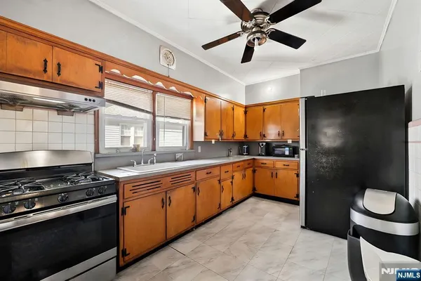 a view of a livingroom and a hallway