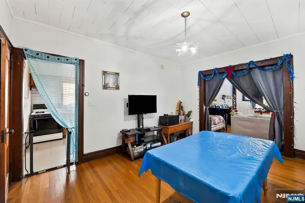 a kitchen with a sink cabinets stainless steel appliances and a window