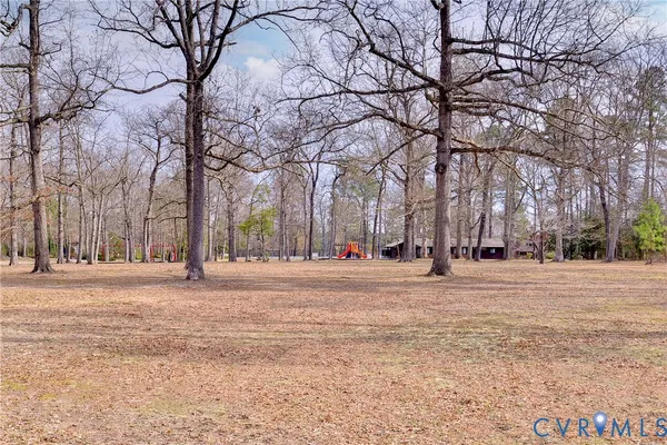 a view of outdoor space with lots of trees