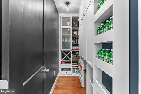 a bedroom with a bed and cabinets