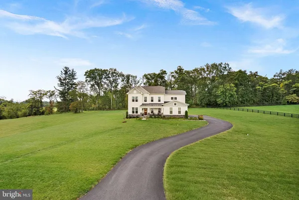 a view of balcony with two chairs and a table