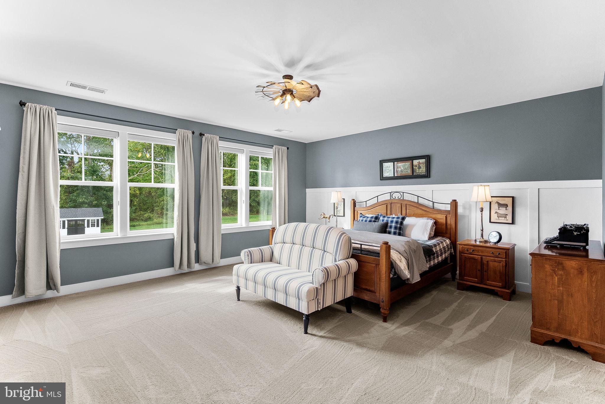 38147 Touchstone Farm Lane Hamilton, VA 20158 - Photo 35 of 71 a bed room with a bed and a couch