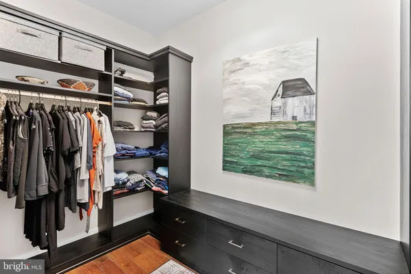 a view of a hallway with a living room