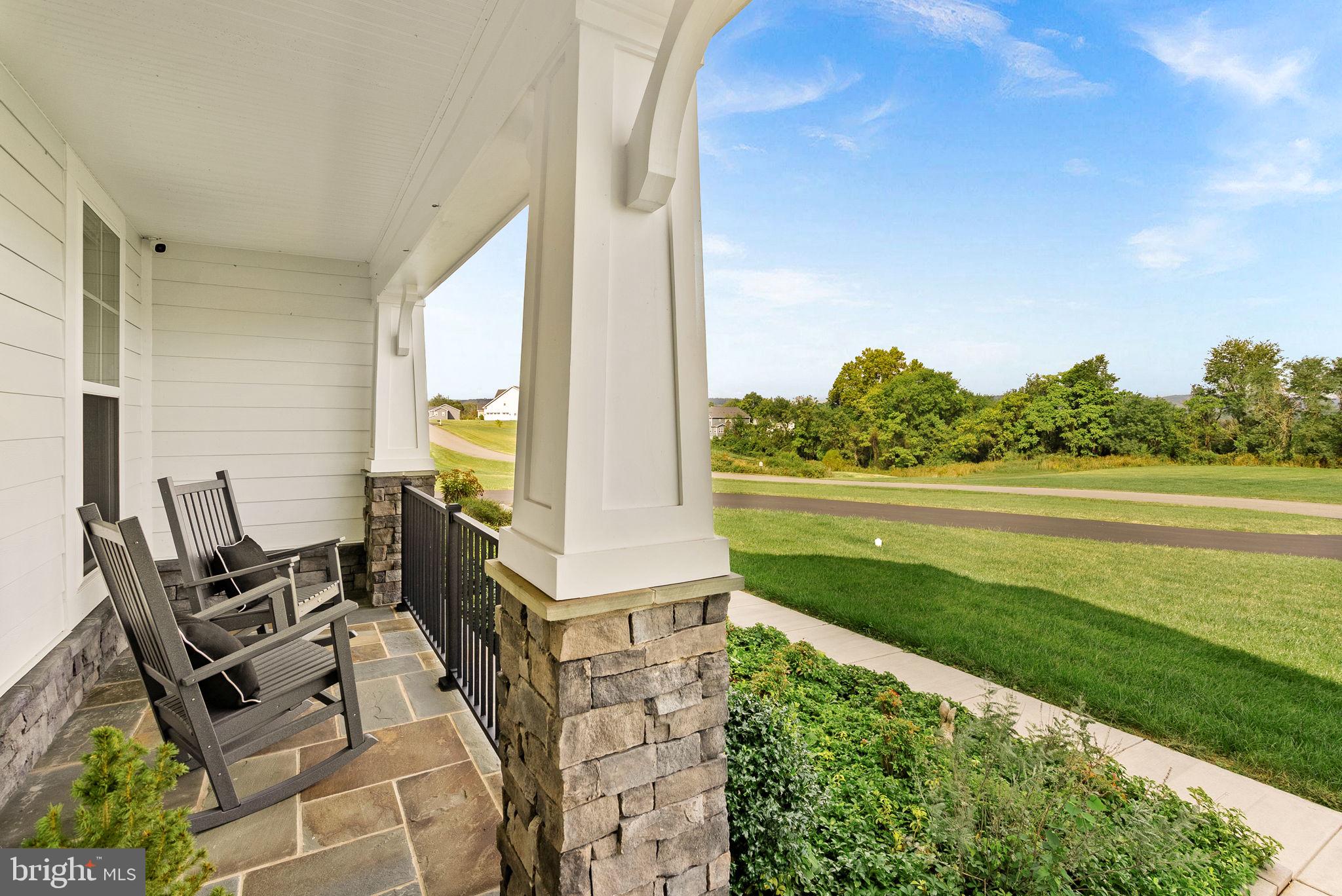 38147 Touchstone Farm Lane Hamilton, VA 20158 - Photo 4 of 71 a view of balcony with two chairs and a table