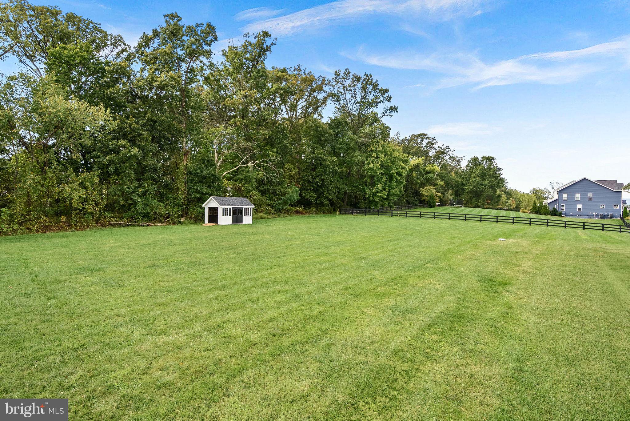 38147 Touchstone Farm Lane Hamilton, VA 20158 - Photo 64 of 71 a view of a green field with wooden fence