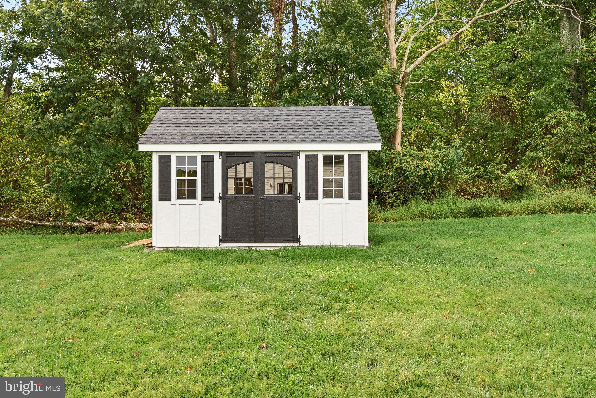 38147 Touchstone Farm Lane Hamilton, VA 20158 - Photo 65 of 71 a front view of a house with a yard and trees